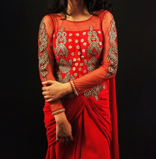 Red
													Embroidered Draped Saree.